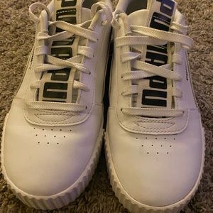 Women’s white Puma tennis sneaker, size 8